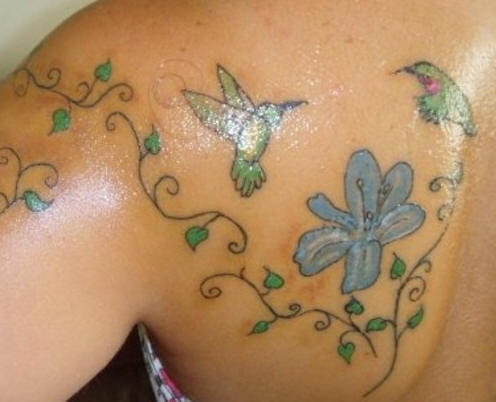 Cute lady hummingbird tracery tattoo