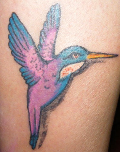 Elegant purple hummingbird tattoo