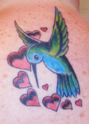 Cute hummingbird and hearts tattoo