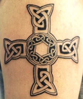 Black celtic pattern cross tattoo