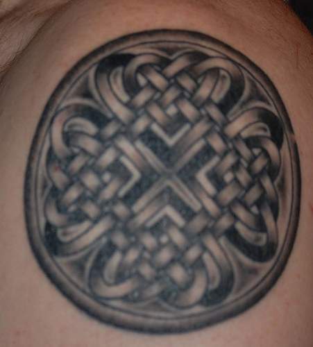 Irish knotted tracery tattoo