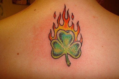 Irish shamrock on fire  tattoo