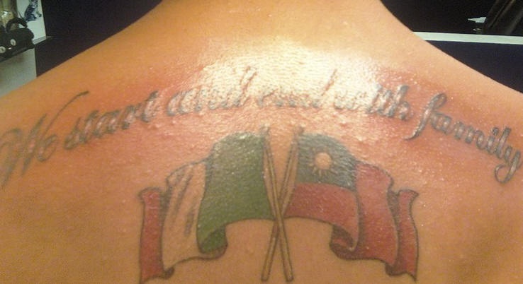 Italian flag tattoo on back