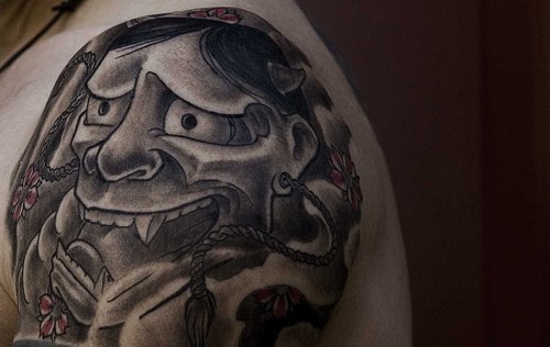 Tatuaje de la cara de un demonio