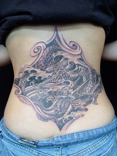 Japanese dragon in sea black ink tattoo