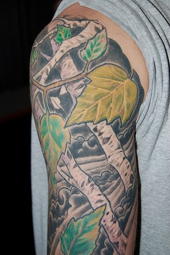 Birch trees and leaves tattoo