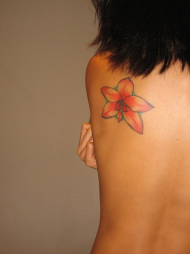 Japanese orchid tattoo on back