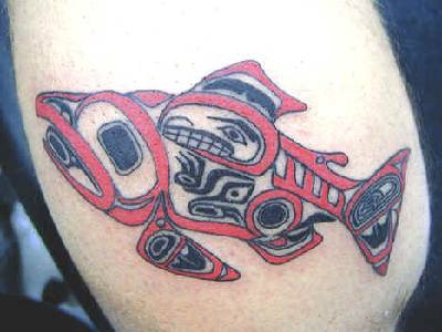 Black and red fish tattoo in egyptian style