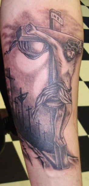 Le tatouage de Jésus crucifié à Golgotha