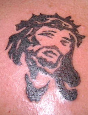 Minimalistic jesus black ink tattoo