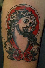 Jesus face traditional tattoo