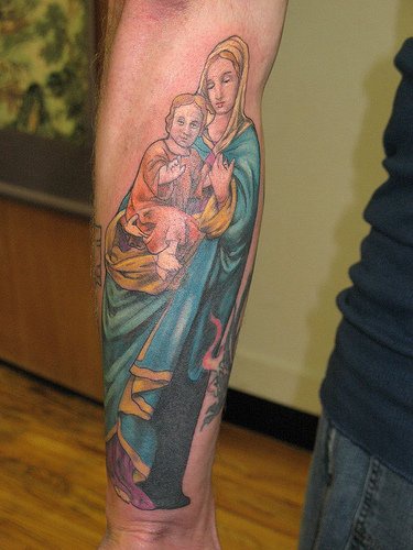 Mary and baby Jesus tattoo in colour
