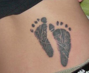 Baby footsteps tattoo
