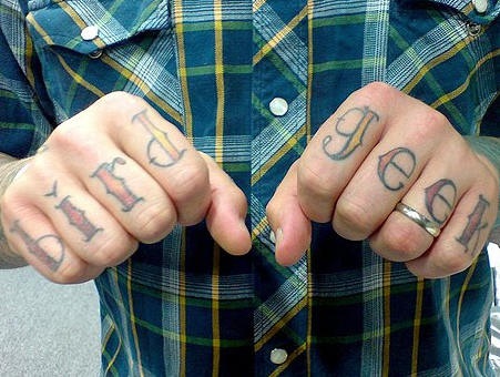 Knuckle tattoo, bird geek , origin style of letters