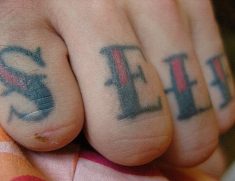 Knuckle tattoo,sell, styled red and black