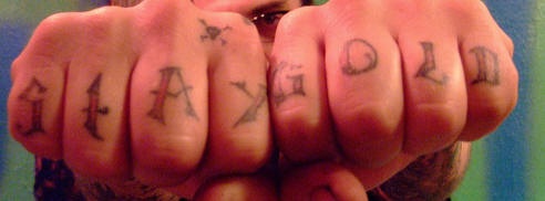Knuckle tattoo, stay gold, sharp edged letters