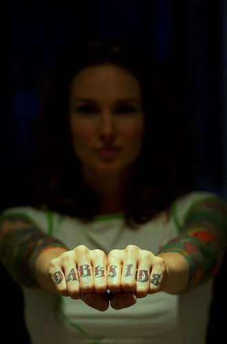 Knuckle tattoo, dark side, red styled words