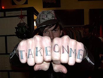 Knuckle tattoo, take on me, big colourful inscription