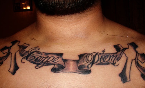 Carpe diem on stripe chest tattoo
