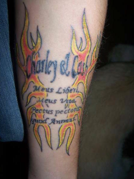 Latin writings in fire tattoo