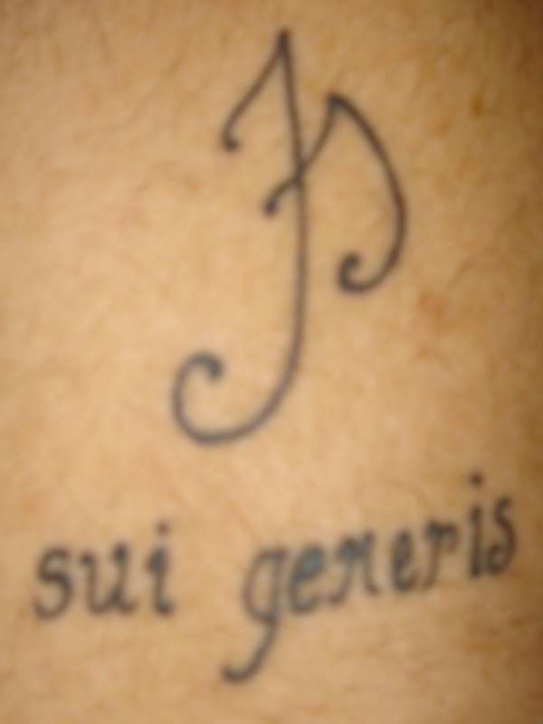 Sui generis monogram tattoo