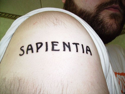 Sapientia black ink tattoo