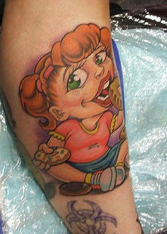 Leg tattoo,caricature girl eating coockies