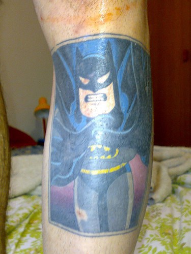Leg tattoo, black, angry cartoon batman