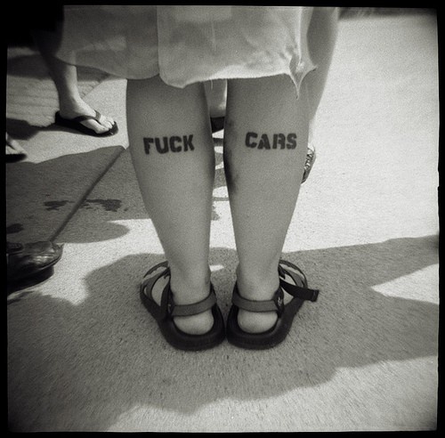 Leg tattoo, fuck cars, black styled inscription