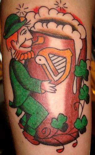 Leprechaun with huge beer bock coloured tattoo