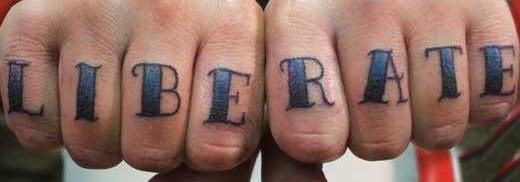 Knuckle tattoo, liberate, blue and black shaded letters