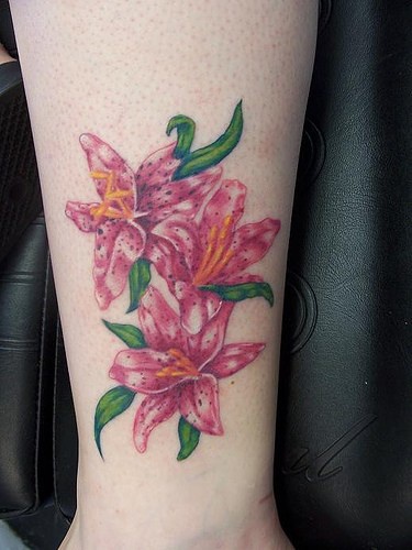 Pink lilies flower tattoo