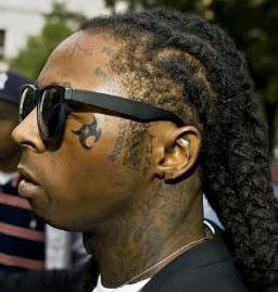Gesichtstattoo bei 	
Lil Wayne