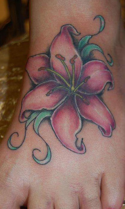 Pink lily tattoo on foot