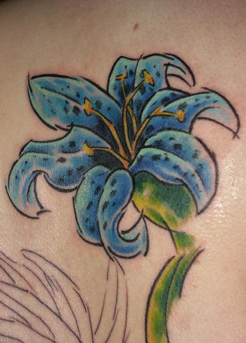 Pale blue lily flower tattoo