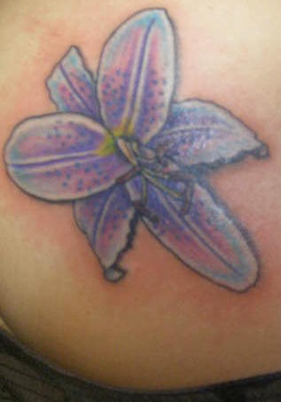 Pale purple lily tattoo
