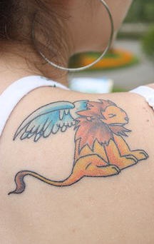 Small winged lion on shoulder