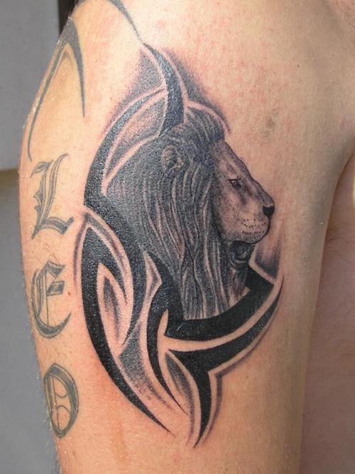 Lion head in tribal tattoo