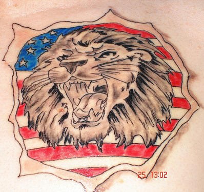 Roaring lion on usa flag tattoo