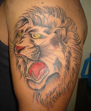 Homemade roaring lion tattoo on arm