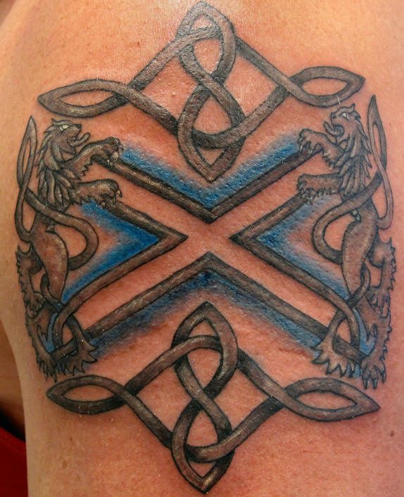 Heraldic lions on crest tattoo