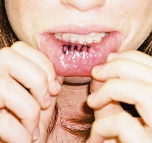 Lip tattoo,crazy, big, black letters