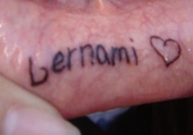 Lip tattoo, lernami love, black inscription