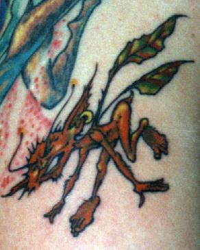 Mythical coloured insect creature tattoo