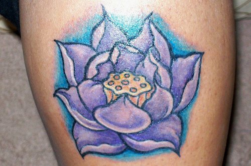 Pale purple lotus blossom tattoo