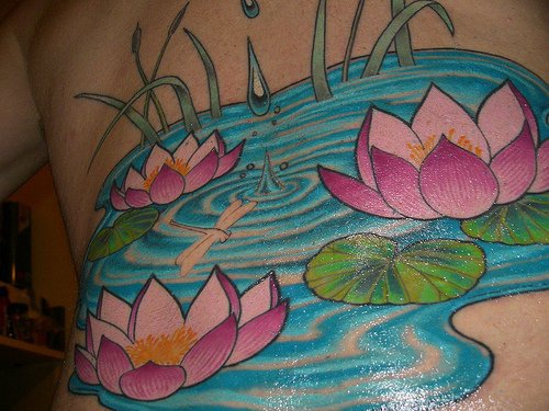 Water lotus in pond coloured tattoo