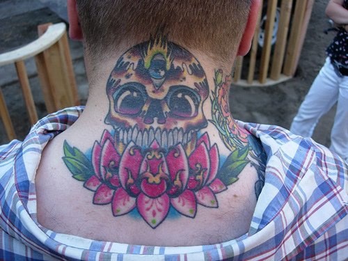Lotus flower with mexican skull on neck