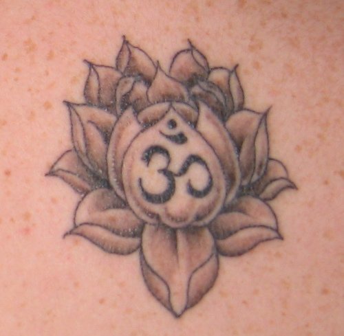 Lotus with aum mantra tattoo