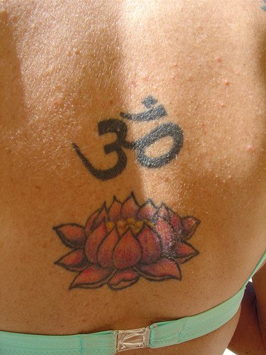 Lotus flower with aum mantra on back