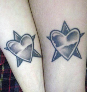 Similar heart on star tattoos